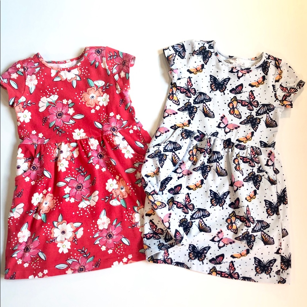 Pair of Rumi + Ryder Patterned Flare Dresses